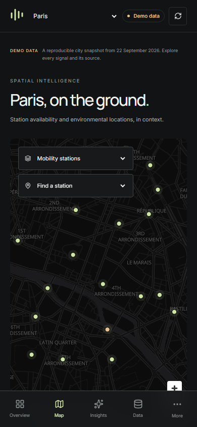 UrbanPulse mobile city map with station markers, layer selection, and bottom navigation